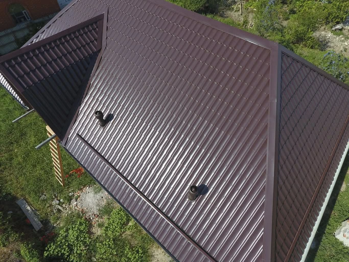 metal roof over shingles