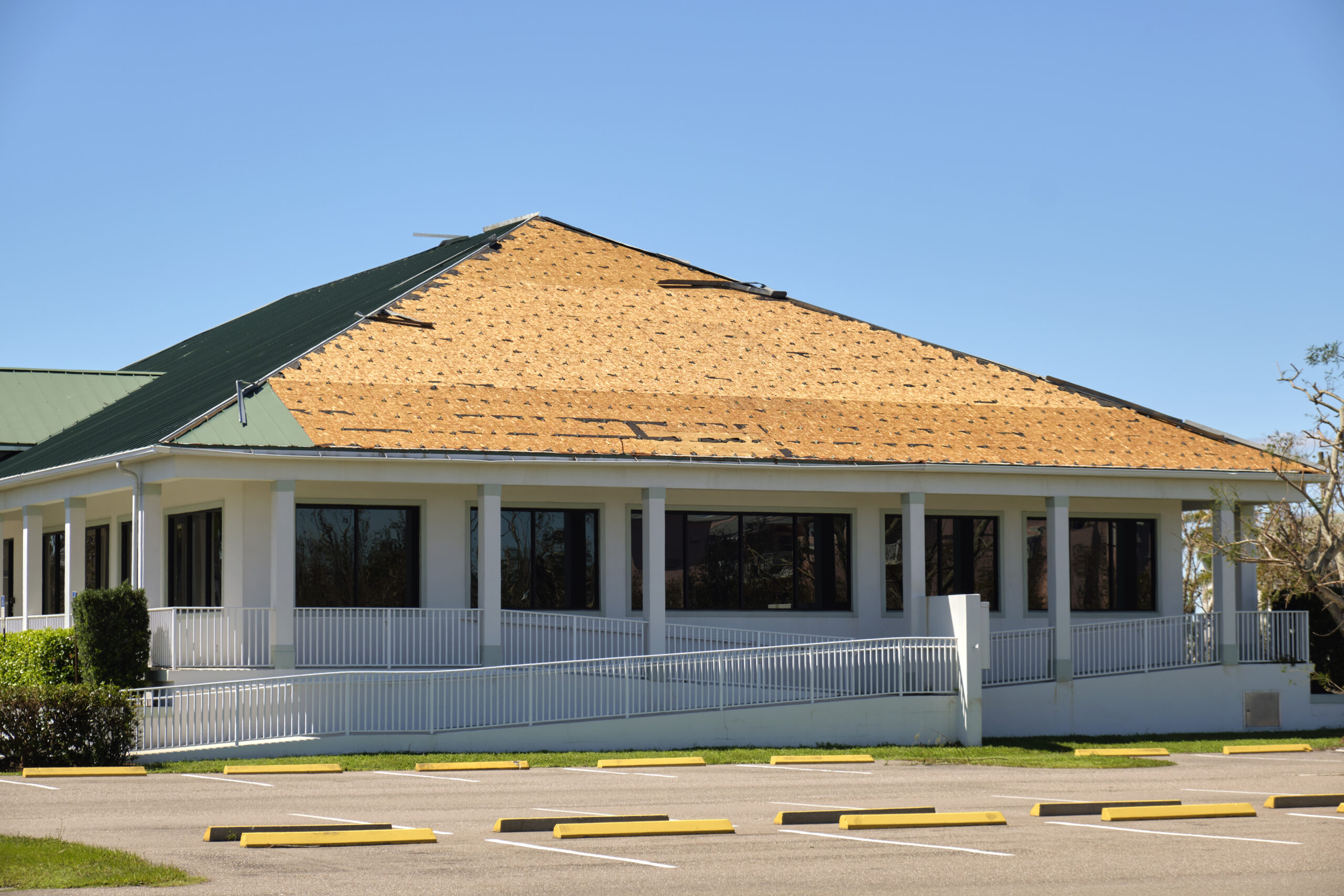 can you put metal roof over shingles